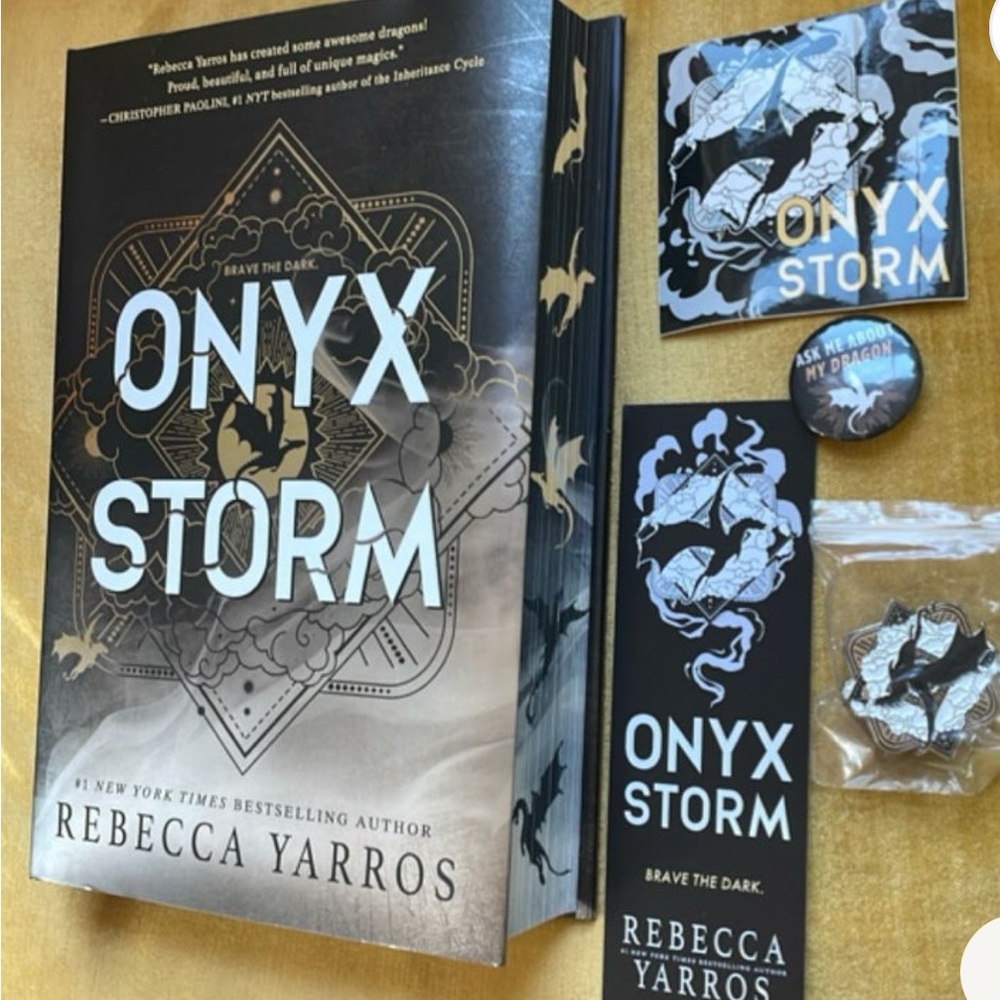 Onyx Storm by Rebecca Yarros with Limited edition pins and sticker